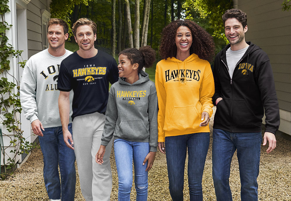 Group of 5 people wearing University of Iowa apparel in various colors and designs